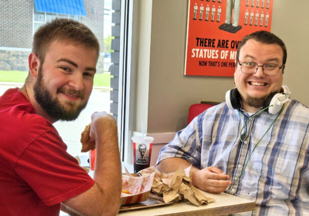 2 men with IDD sitting at a table