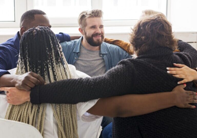 Medium Shot People Hugging Meeting